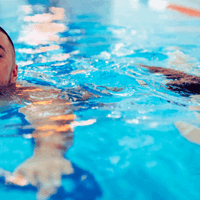 adult and child swimming
